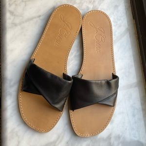 Brand new never worn J.Crew slip on sandals in a size 11 in classic black.